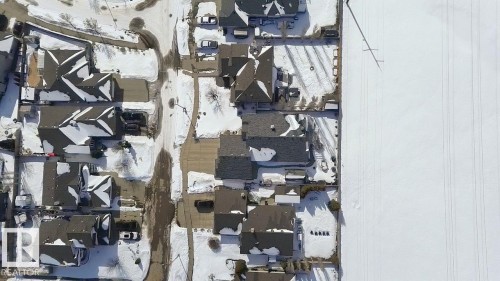Residential neighborhood featuring varied single-family homes with gray shingle roofs - 30 Valleyview Ridge, Fort Saskatchewan, AB - 