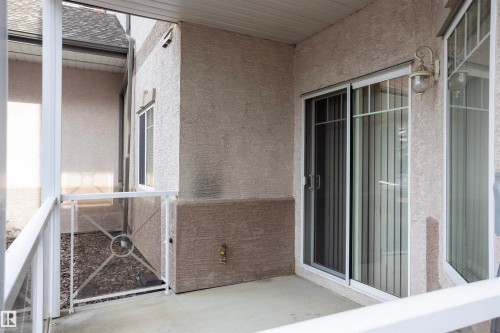 Screened balcony with concrete flooring - 101 2420 108 Street, Edmonton, AB - Outdoor With Exterior