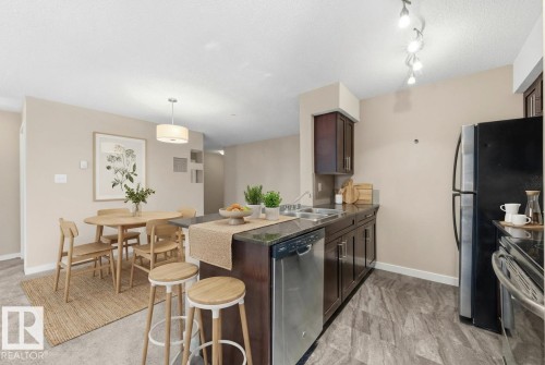 221 1070 Mcconachie Boulevard, Edmonton, AB - Indoor Photo Showing Kitchen With Double Sink