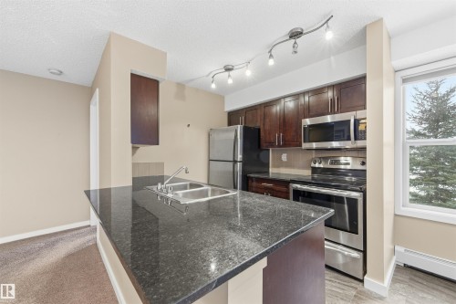 221 1070 Mcconachie Boulevard, Edmonton, AB - Indoor Photo Showing Living Room