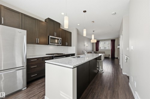 4 320 Secord Boulevard, Edmonton, AB - Indoor Photo Showing Kitchen With Stainless Steel Kitchen With Upgraded Kitchen