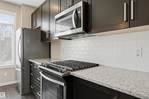4 320 Secord Boulevard, Edmonton, AB - Indoor Photo Showing Kitchen With Upgraded Kitchen
