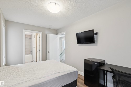 8724 116 Street, Edmonton, AB - Indoor Photo Showing Bedroom