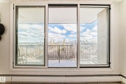 Sliding glass doors opening to an outdoor balcony - 