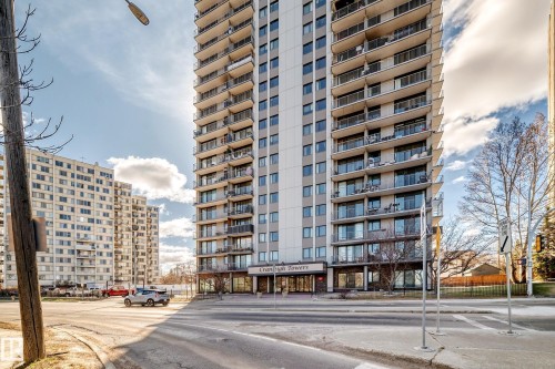High-rise building featuring multiple levels of private balconies with glass and metal railings - 405 10135 Saskatchewan Drive Nw, Edmonton, AB - Outdoor With Facade