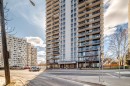 High-rise building featuring multiple levels of private balconies with glass and metal railings - 405 10135 Saskatchewan Drive Nw, Edmonton, AB  - Outdoor With Facade 