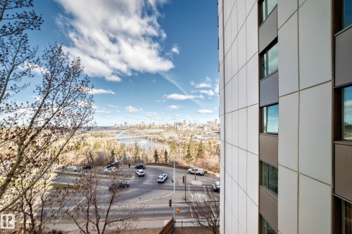 High-rise exterior featuring a multi-story window design and light-colored paneling - 601 10135 Saskatchewan Drive Nw, Edmonton, AB - Outdoor With View