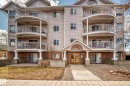 Multi-story residential building featuring light-colored siding and brick accents - 101 10827 85 Avenue Nw, Edmonton, AB  - Outdoor With Facade 