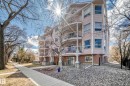 Multi-story building featuring light-toned siding and brick accents - 101 10827 85 Avenue Nw, Edmonton, AB  - Outdoor With Facade 