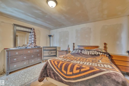 View of bedroom - 21 Calmar Mobile Home Park, Calmar, AB - Indoor Photo Showing Bedroom