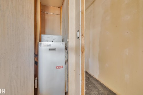 Utility room with a heating unit - 21 Calmar Mobile Home Park, Calmar, AB - Indoor