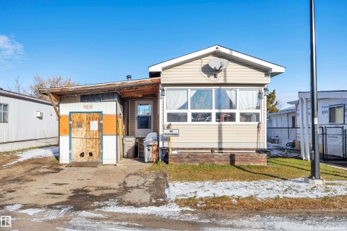 Manufactured / mobile home with a sunroom - 21 Calmar Mobile Home Park, Calmar, AB - Outdoor