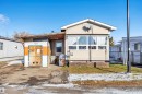 Manufactured / mobile home with a sunroom - 21 Calmar Mobile Home Park, Calmar, AB  - Outdoor 