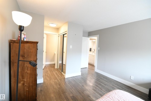 The master suite will easily support king sized furniture, and has a double walk through closet, as well as a spa quality 4 piece ensuite with tile, and contemporary finishes.  This bedroom is a welcome treat - 206 8125 110 Street, Edmonton, AB - Indoor