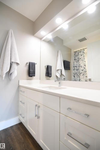 The master ensuite is very nicely appointed, with a full soaker tub, surround, tile accents, and the same high level of fit an finish found in the rest of the unit.  Gorgeous - 206 8125 110 Street, Edmonton, AB - Indoor Photo Showing Bathroom