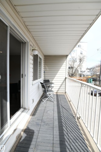 The large balcony is over 16 feet long, and looks out to the south.  This is a great space to enjoy some sun - 206 8125 110 Street, Edmonton, AB - Outdoor With Exterior