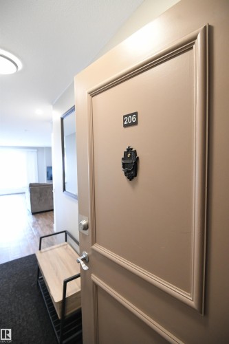 The design of the building gives this unit some additional size over some of the other suites in the building.  Quiet, mature residents clearly demonstrate pride in their building - 206 8125 110 Street, Edmonton, AB - Indoor Photo Showing Other Room