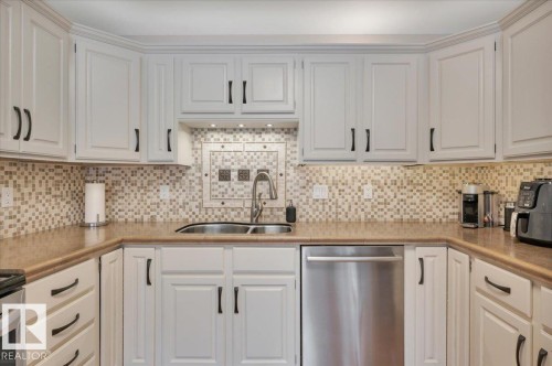 705 Riddell Street, Edmonton, AB - Indoor Photo Showing Kitchen With Double Sink