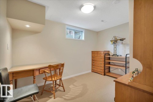 Could be another bedroom - 705 Riddell Street, Edmonton, AB - Indoor Photo Showing Other Room