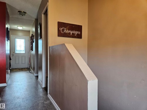 Showing Front Door Entrance as well - 4706 44 Avenue, St. Paul Town, AB - Indoor Photo Showing Other Room