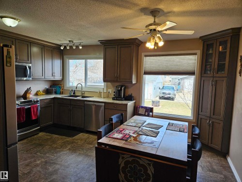 With eating area shown - 4706 44 Avenue, St. Paul Town, AB - Indoor Photo Showing Kitchen