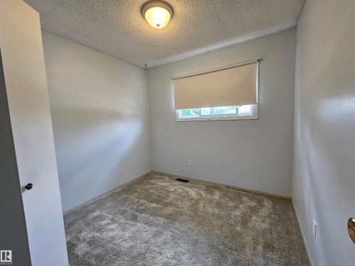 3 of 3 Bedrooms on main floor - 4706 44 Avenue, St. Paul Town, AB - Indoor Photo Showing Other Room