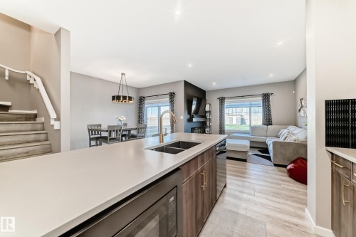 143 Larch Crescent, Leduc, AB - Indoor Photo Showing Kitchen With Double Sink