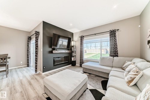 143 Larch Crescent, Leduc, AB - Indoor Photo Showing Living Room With Fireplace