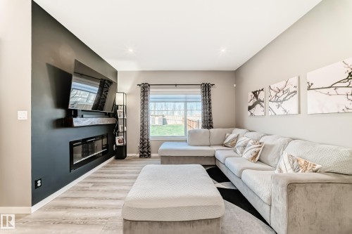 143 Larch Crescent, Leduc, AB - Indoor Photo Showing Living Room With Fireplace
