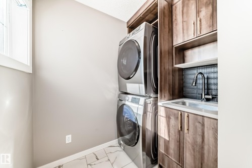 143 Larch Crescent, Leduc, AB - Indoor Photo Showing Laundry Room