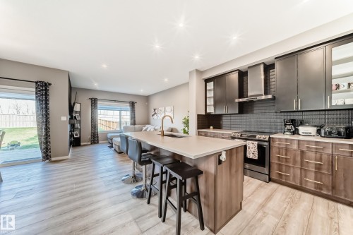 143 Larch Crescent, Leduc, AB - Indoor Photo Showing Kitchen With Upgraded Kitchen