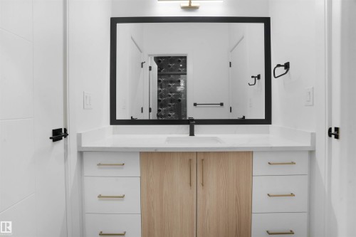 Modern vanity with quartz countertop and undermount sink - 22139 81 Avenue, Edmonton, AB - 