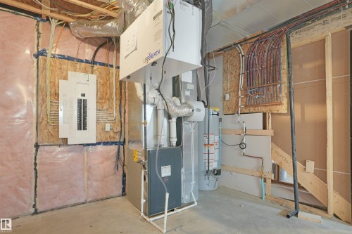 New construction utility room featuring a circuit breaker panel, water heater, HVAC system, and PEX plumbing manifold - 22139 81 Avenue, Edmonton, AB - Indoor Photo Showing Basement