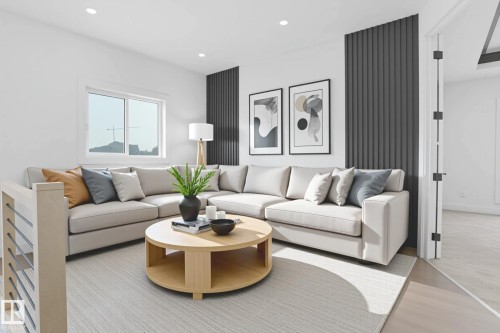 Living area featuring recessed lighting and a large window - 22139 81 Avenue, Edmonton, AB - Indoor Photo Showing Living Room