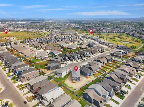 Aerial perspective showcasing a residential development with an array of contemporary homes - 22139 81 Avenue, Edmonton, AB - Outdoor With View