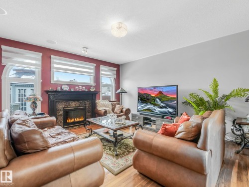 16237 129A Street, Edmonton, AB - Indoor Photo Showing Living Room With Fireplace