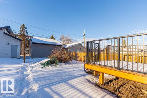 Elevated deck with black metal railings - 9814 155 Street, Edmonton, AB - Outdoor
