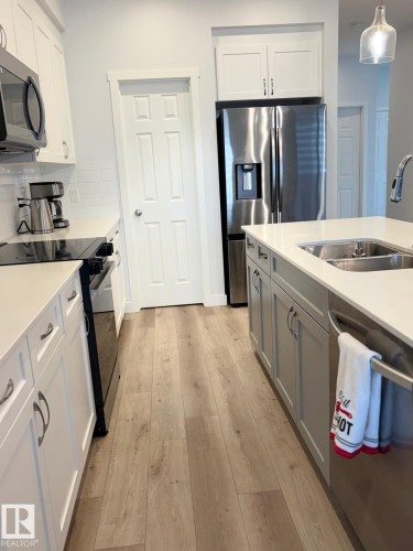 3234 Dixon Way, Edmonton, AB - Indoor Photo Showing Kitchen With Double Sink