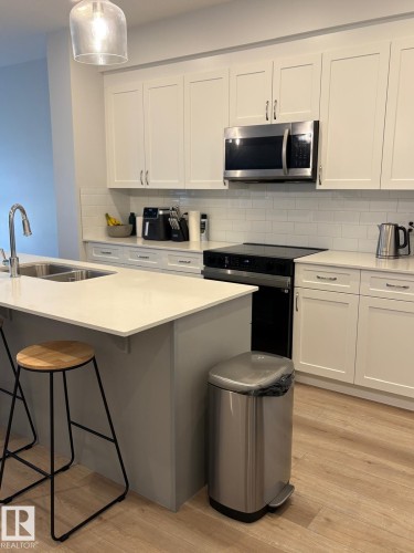 3234 Dixon Way, Edmonton, AB - Indoor Photo Showing Kitchen With Double Sink