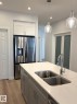3234 Dixon Way, Edmonton, AB  - Indoor Photo Showing Kitchen With Double Sink 
