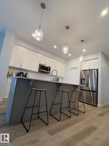 3234 Dixon Way, Edmonton, AB - Indoor Photo Showing Kitchen With Upgraded Kitchen