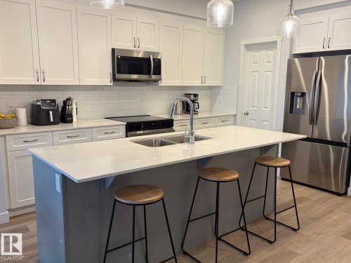 3234 Dixon Way, Edmonton, AB - Indoor Photo Showing Kitchen With Double Sink With Upgraded Kitchen
