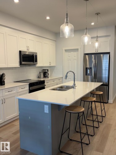 3234 Dixon Way, Edmonton, AB - Indoor Photo Showing Kitchen With Double Sink With Upgraded Kitchen