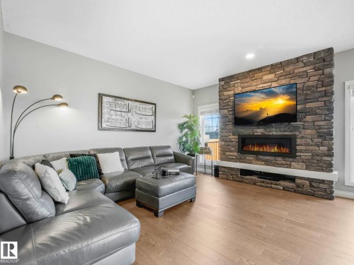 8427 216 Street, Edmonton, AB - Indoor Photo Showing Living Room With Fireplace