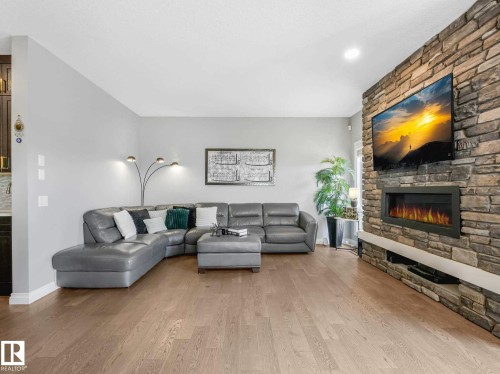 8427 216 Street, Edmonton, AB - Indoor Photo Showing Living Room With Fireplace
