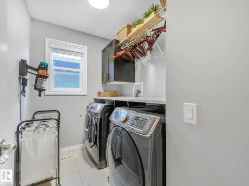 8427 216 Street, Edmonton, AB - Indoor Photo Showing Laundry Room