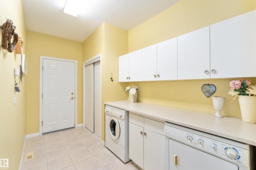 8 Butterworth Point(E), Edmonton, AB - Indoor Photo Showing Laundry Room