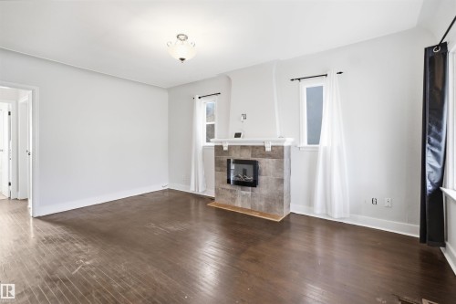 11617 89 Street, Edmonton, AB - Indoor Photo Showing Living Room With Fireplace