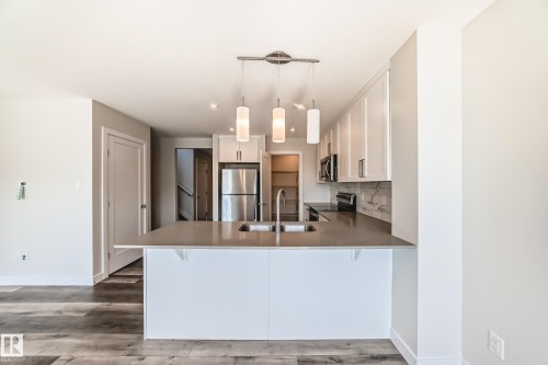55 Ebbers Close, Edmonton, AB - Indoor Photo Showing Kitchen With Stainless Steel Kitchen With Double Sink