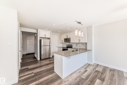 55 Ebbers Close, Edmonton, AB - Indoor Photo Showing Kitchen With Double Sink
